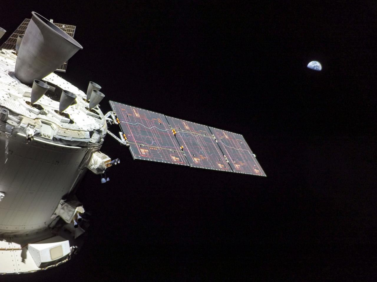 art001e001721  (Nov. 30, 2022) A camera mounted on the tip of one of Orion’s solar arrays captured the Earth as the spacecraft was in a distant lunar orbit.