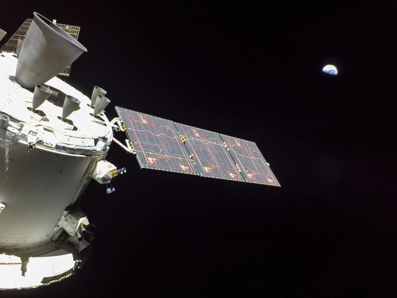 art001e001722  (Nov. 30, 2022) A camera mounted on the tip of one of Orion’s solar arrays captured the Earth as the spacecraft was in a distant lunar orbit.