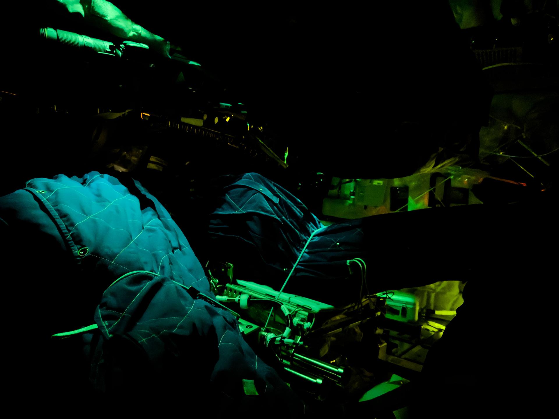 art002e009215 (April 6, 2026) - Artemis II crewmember sleeping bags are illuminated inside the Orion spacecraft on Flight Day 5...