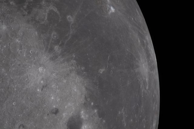 A diverse set of lunar features is visible in this view,...