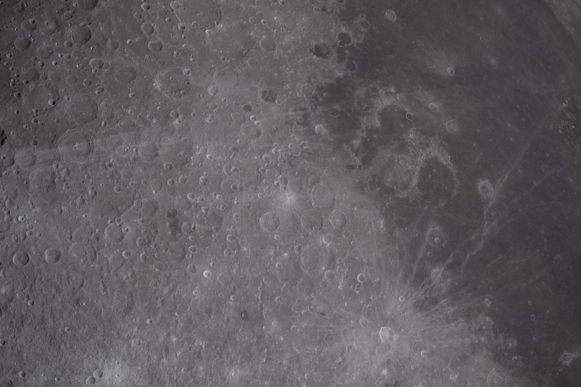 art002e012153 (April 6, 2026) - The small, bright spot in the center of the image is the crater that the Artemis II crew have proposed as Carroll, after Commander Reid Wiseman’s late wife. About 3.5 miles across (5.6 km in diameter), the proposed Carroll crater is on the nearside of the lunar surface on the western edge and would be visible from Earth with powerful telescopes.
