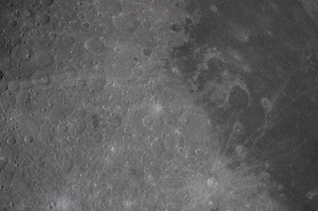 The small, bright spot in the center of the image is the...