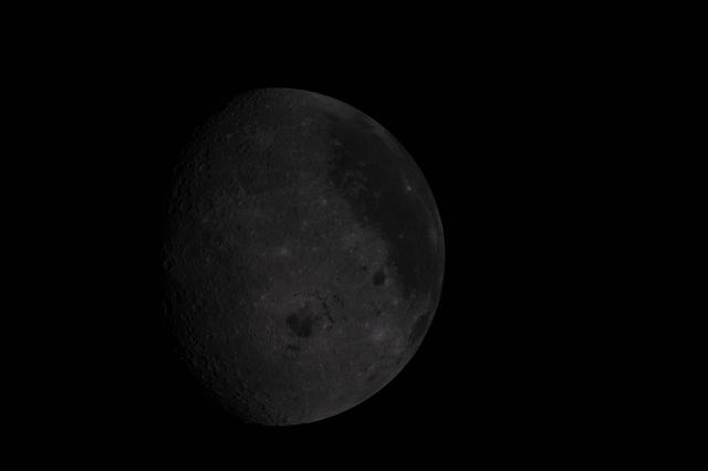 A shot from early in the Artemis II lunar flyby, taken with a...