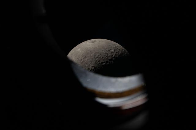 The Moon seen peeking above the window sill of the Orion...