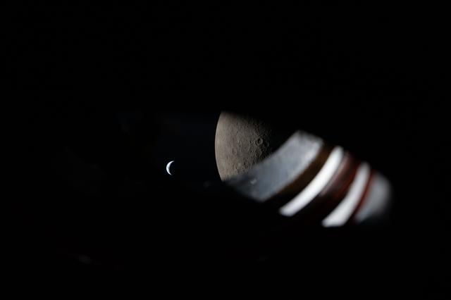 A view from the window of the Orion spacecraft approximately...