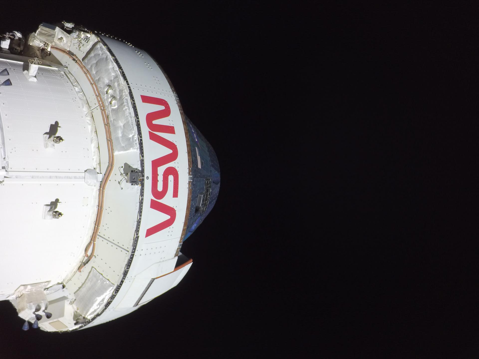 art002e012495 (April 7, 2026) - NASA’s Orion spacecraft is pictured here from one of the cameras mounted on its solar array wings. At the time this photo was taken at 9:03 a.m. ET, the Artemis II crew was in a sleep period ahead of beginning their seventh day into the mission. Credit: NASA