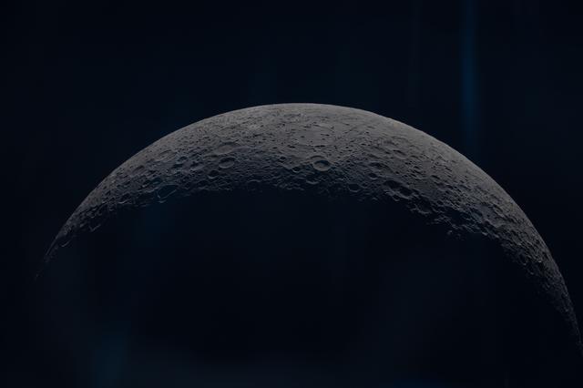 The Artemis II crew captures the Moon's curved limb during...