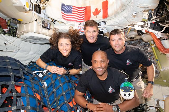 The Artemis II crew – (clockwise from left) Mission...