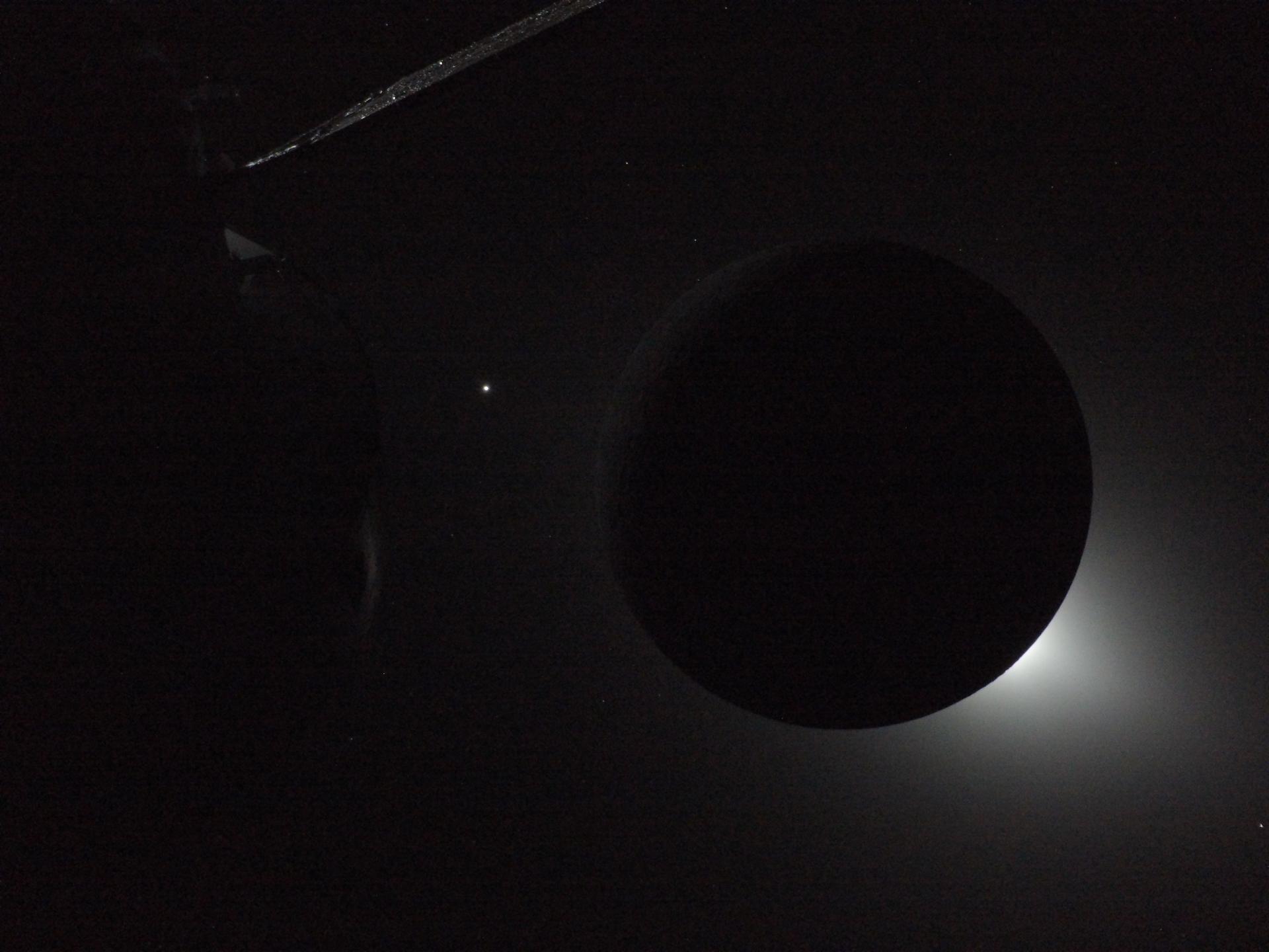 art002e016312 (April 7, 2026) – A vehicle camera mounted on NASA’s Orion spacecraft captured this view of lunar sunrise as the Sun emerged from behind the Moon. The Moon appears in silhouette as sunlight and the faint solar corona extend from behind its edge. The image was captured as part of a time-lapse sequence documenting the changing view during sunrise.