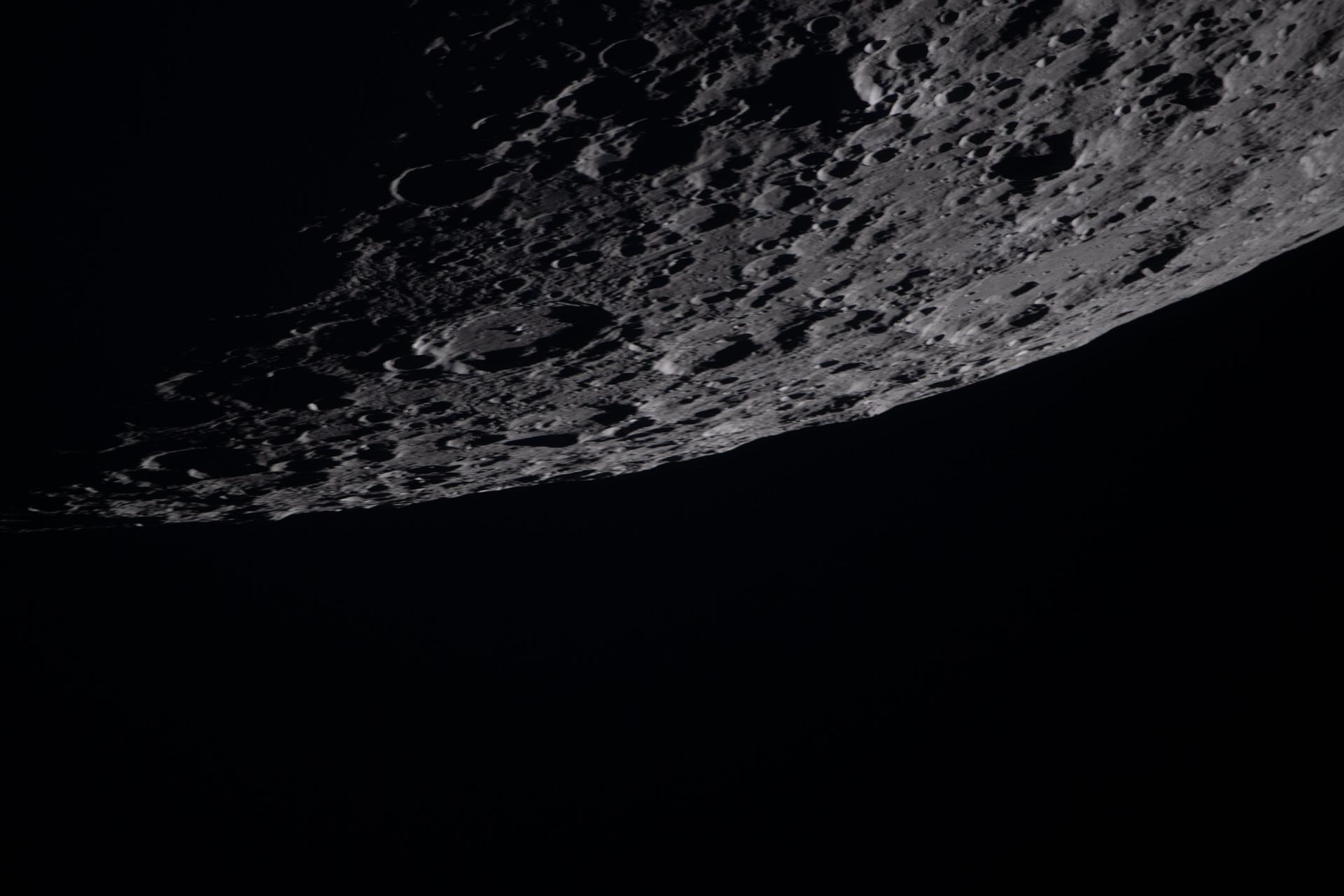 art002e020904 (April 6, 2026) – As the Artemis II crew went around the Moon,  during one of the observation periods, the crew captured the details of the lunar terrain, showcasing the rugged craters, deep basins, and the black expanse of space below. Credit: NASA