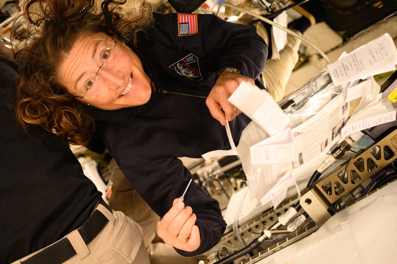 Christina Koch Readies for Saliva Sample Collection