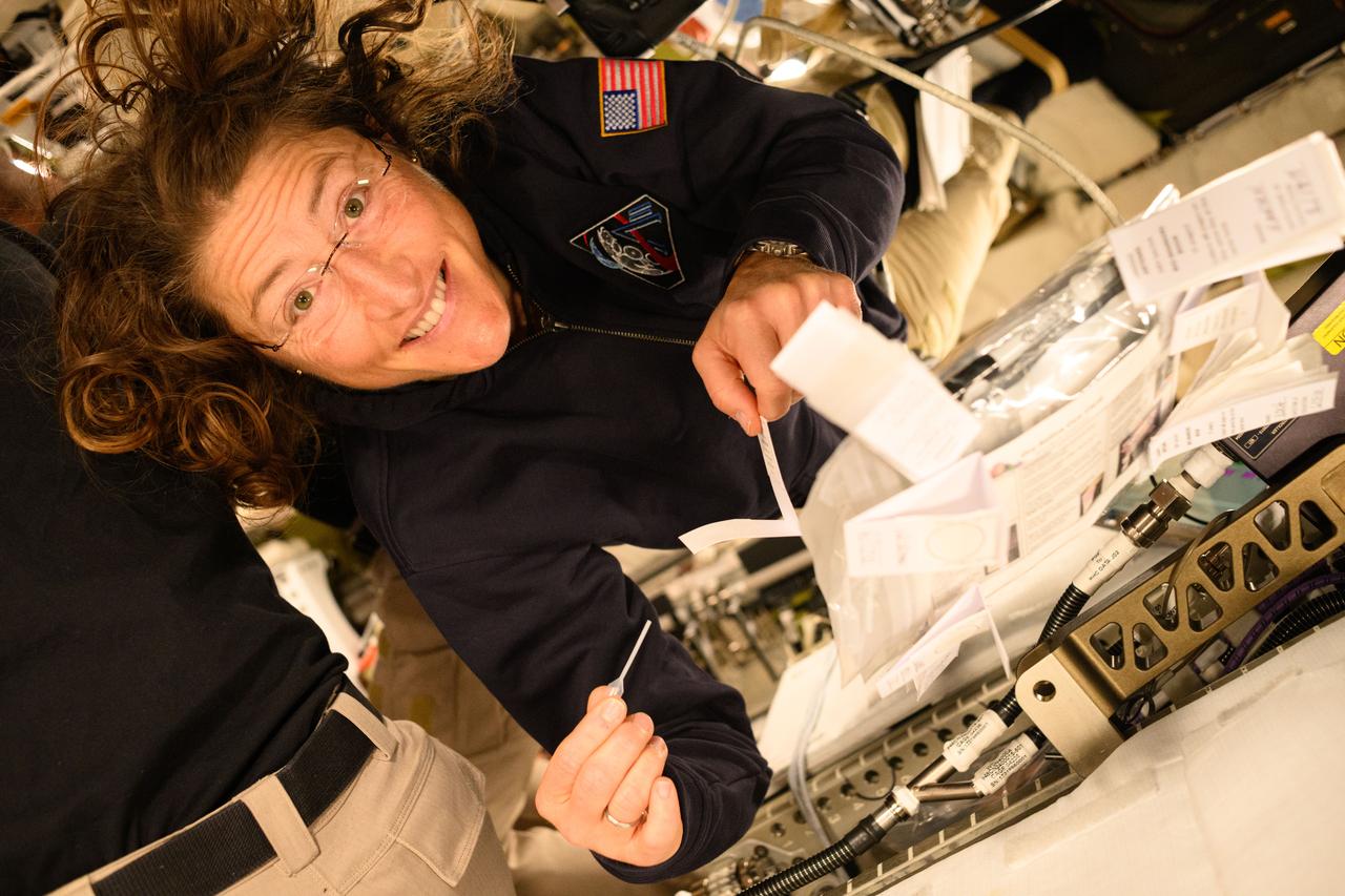Christina Koch Readies for Saliva Sample Collection