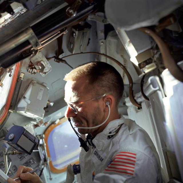 NASA image: Astronaut Walter Cunningham photographed performing flight tasks