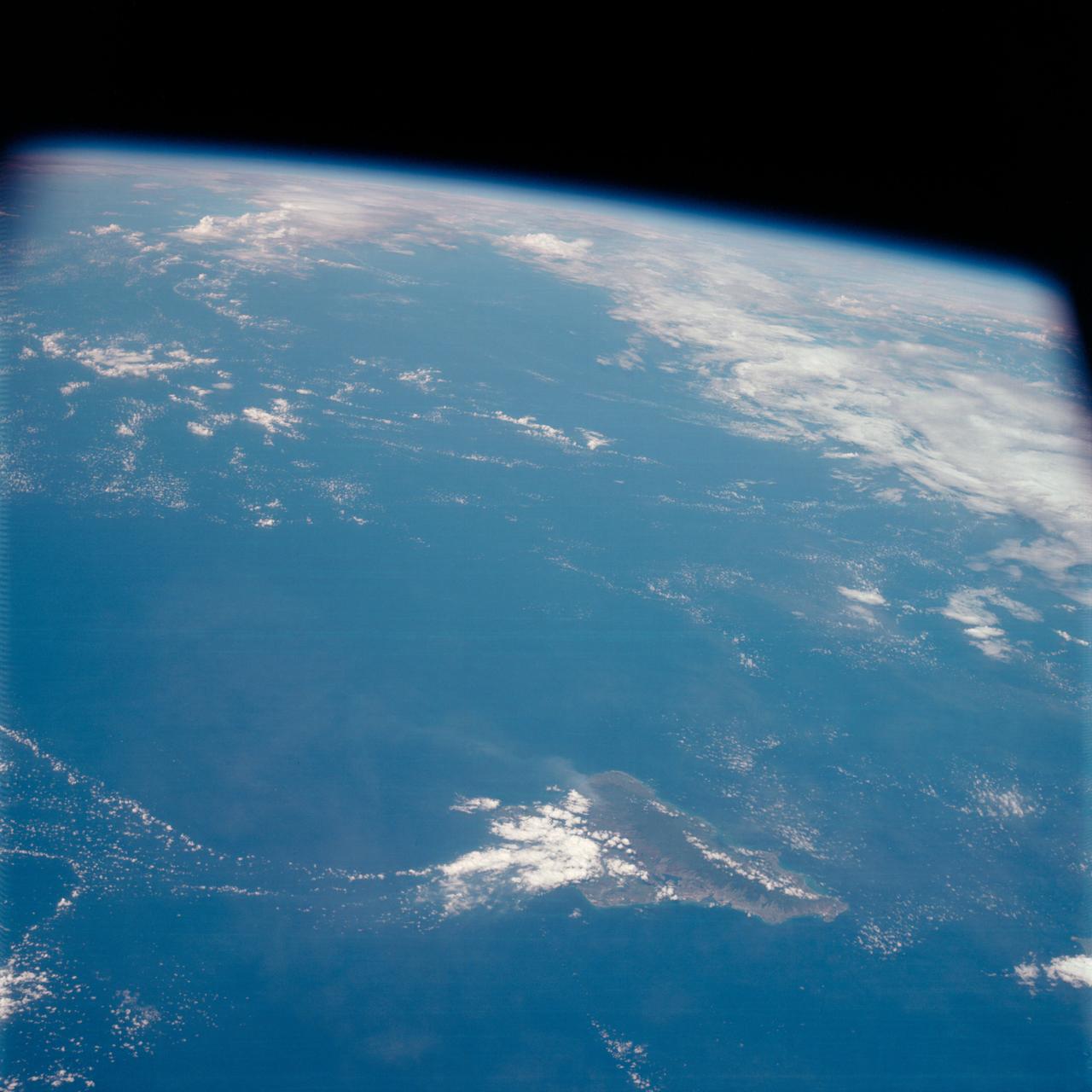 AS7-07-1741 (14 Oct. 1968) --- Island of Oahu, State of Hawaii, as seen from the Apollo 7 spacecraft during its 51st revolution of Earth. Photographed from an altitude of 122 nautical miles, at ground elapsed time of 81 hours. Diamond Head and Pearl Harbor are clearly visible.