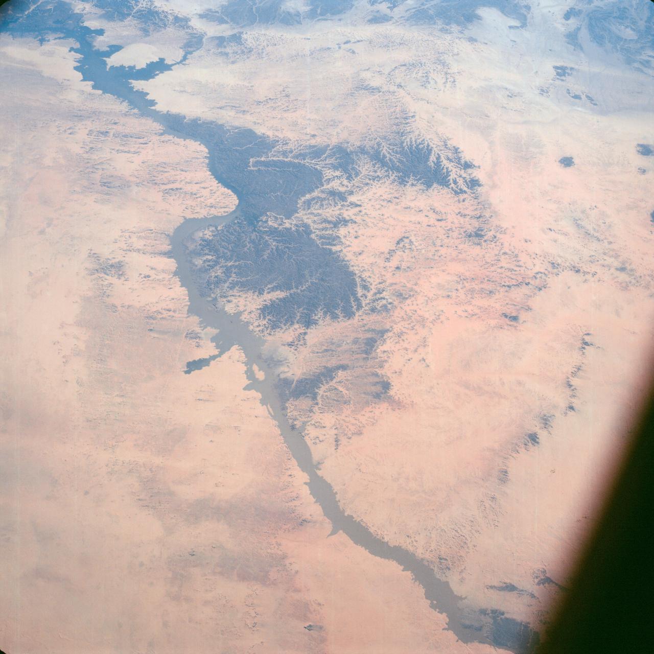 Lake Nasser on the Nile River in southeastern United Arab Republic (Egypt) as seen from the Apollo 7 spacecraft during its 10th revolution of the earth. Photographed from an altitude of 130 nautical miles, at ground elapsed time of 14 hours and 56 minutes. Lake Nasser was created by the contruction of the Aswan Dam on the Nile.