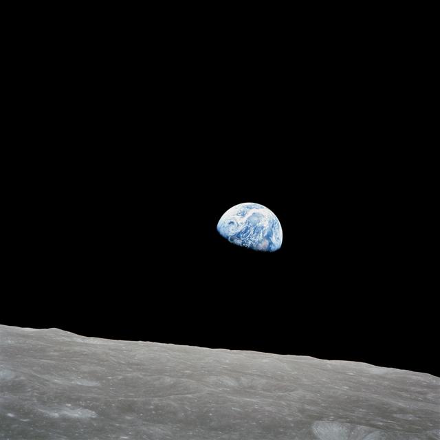 NASA image: Apollo 8 Mission image, Earth over the horizon of the moon