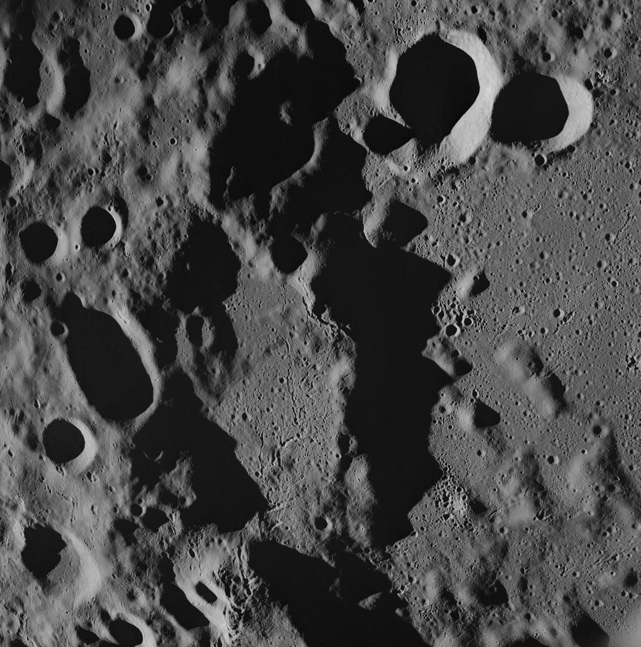 AS08-17-2670 (21-27 Dec. 1968) --- Near vertical view of the lunar farside as photographed from the Apollo 8 spacecraft. The center of the picture is located approximately at 162 degrees west longitude and 6 degrees south latitude.