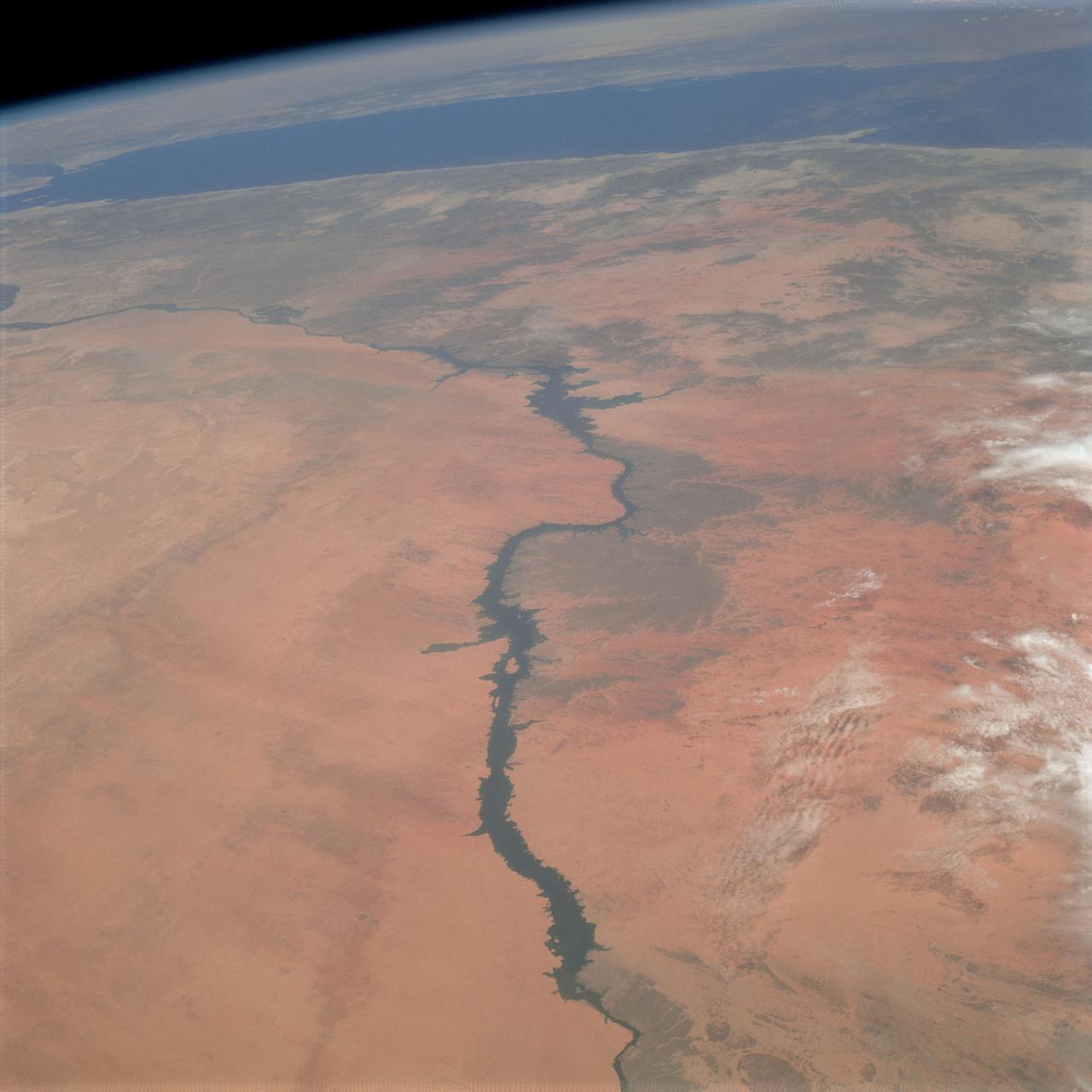 Oblique Earth Observation taken by the Apollo 9 crew. View is the United Arab Republic,the Nile River,The Red Sea and the Aswan Dam. Film magazine was E,film type was SO-368 Ektachrome with 0.460 - 0.710 micrometers film / filter transmittance response and haze filter,80mm lens. Latitude was 19.38 N by Longitude 30.24 E, Overlap was 50%, Altitude was 97 nautical miles and cloud cover was 5%. 