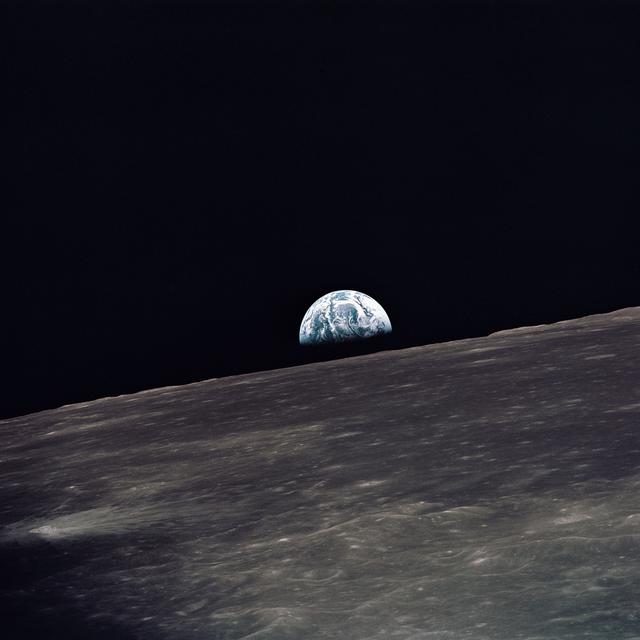 NASA image: Apollo 10 view of the Earth rising above the lunar horizon
