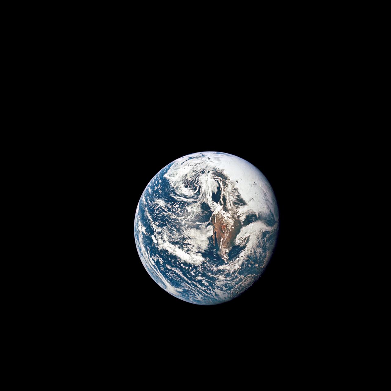 AS10-34-5013 (18 May 1969) --- A view of Earth from 36,000 nautical miles away as photographed from the Apollo 10 spacecraft during its trans-lunar journey toward the moon. While the Yucatan Peninsula is obscured by clouds, nearly all of Mexico north of the Isthmus of Tehuantepec can be clearly delineated. The Gulf of California and Baja California and the San Joaquin Valley can be easily identified. Also, the delta of the Rio Grande River and the Texas coast are visible. Note the color differences (greens - east, browns - west) along the 100 degrees meridian. The crew members on Apollo 10 are astronauts Thomas P. Stafford, commander; John W. Young, command module pilot; and Eugene E. Cernan, lunar module pilot. Astronaut Young remained in lunar orbit, in the Command and Service Modules (CSM) "Charlie Brown", while astronauts Stafford and Cernan descended to within nine miles of the lunar surface, in the Lunar Module (LM) "Snoopy".
