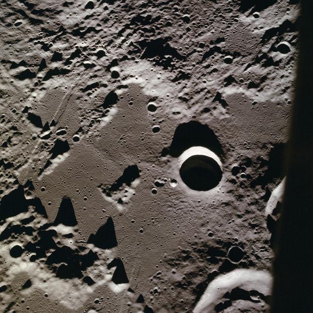 NASA image: Apollo 11 Mission image - CSM over the Sea of Tranquility
