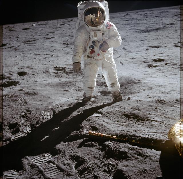 NASA image: Astronaut Edwin Aldrin walks on lunar surface near leg of Lunar Module