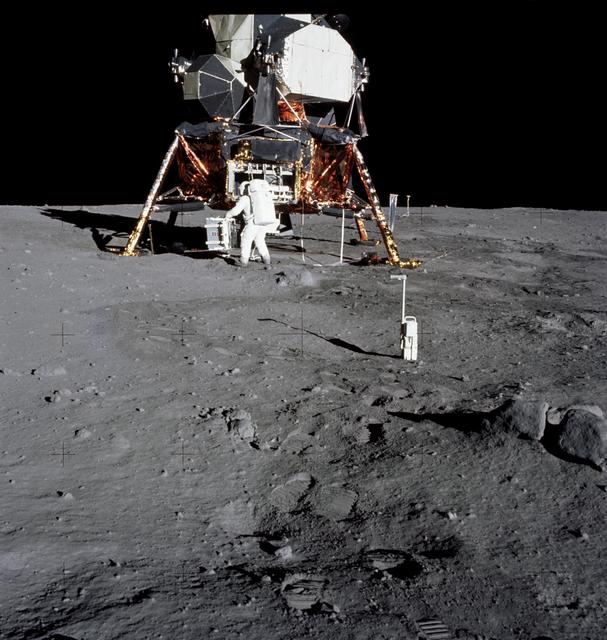 Astronaut Edwin Aldrin prepares to deploy EASEP on surface of moon