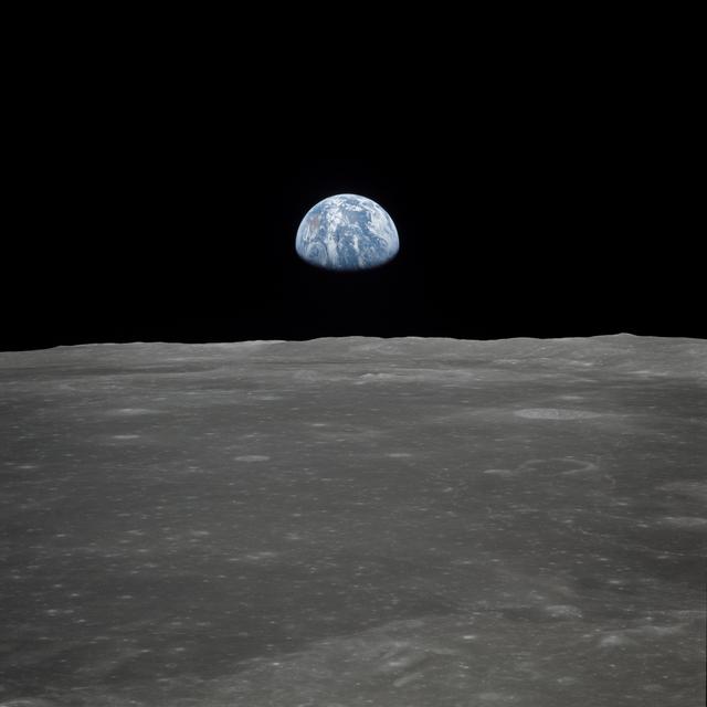 NASA image: View of Earth rising over Moon's horizon taken from Apollo 11 spacecraft