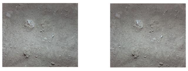 NASA image: Apollo 11 stereo view showing lump of surface powder with glassy material