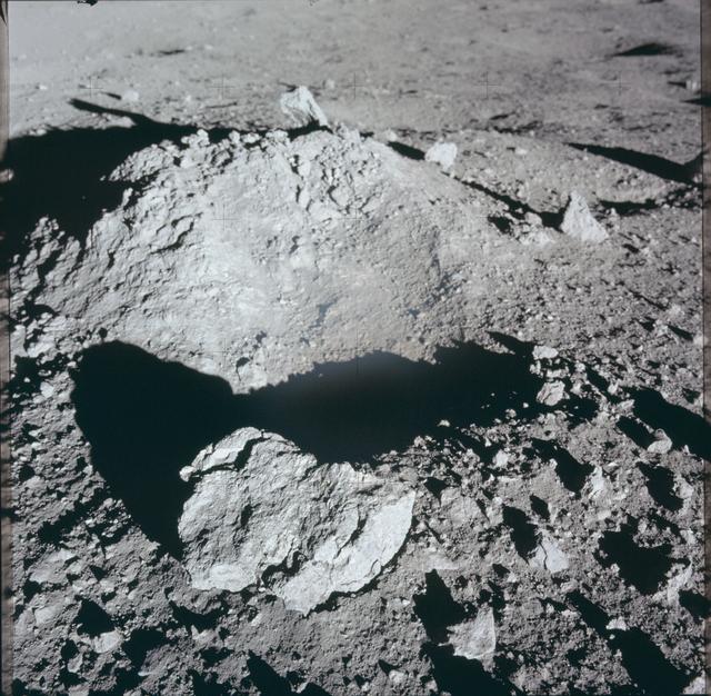 NASA image:    Apollo 12 Mission image - View of lunar surface mound 