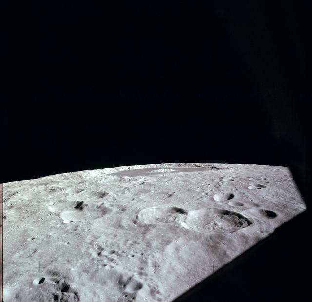NASA image: Apollo 12 Mission image - High oblique view of Craters 285,287 and Tsiolkovski 