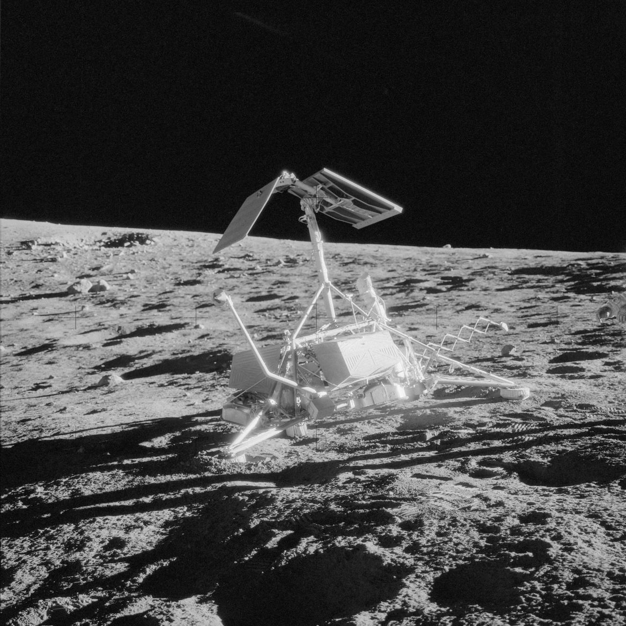 AS12-48-7121 (20 Nov. 1969) --- An excellent view of the unmanned Surveyor 3 spacecraft which was photographed during the Apollo 12 second extravehicular activity (EVA) on the surface of the moon. The Apollo 12 Lunar Module (LM), with astronauts Charles Conrad Jr., commander, and Alan L. Bean, lunar module pilot, aboard landed within 600 feet of Surveyor 3 in the Ocean of Storms. The television camera and several other pieces were taken from Surveyor 3 and brought back to Earth for scientific examination. Surveyor 3 landed on the side of this small crater in the Ocean of Storms on April 19, 1967. Astronaut Richard F. Gordon Jr., command module pilot, remained with the Apollo 12 Command and Service Modules (CSM) in lunar orbit while Conrad and Bean descended to explore the moon.