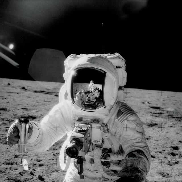 NASA image: Astronaut Alan Bean holds Special Environmental Sample Container