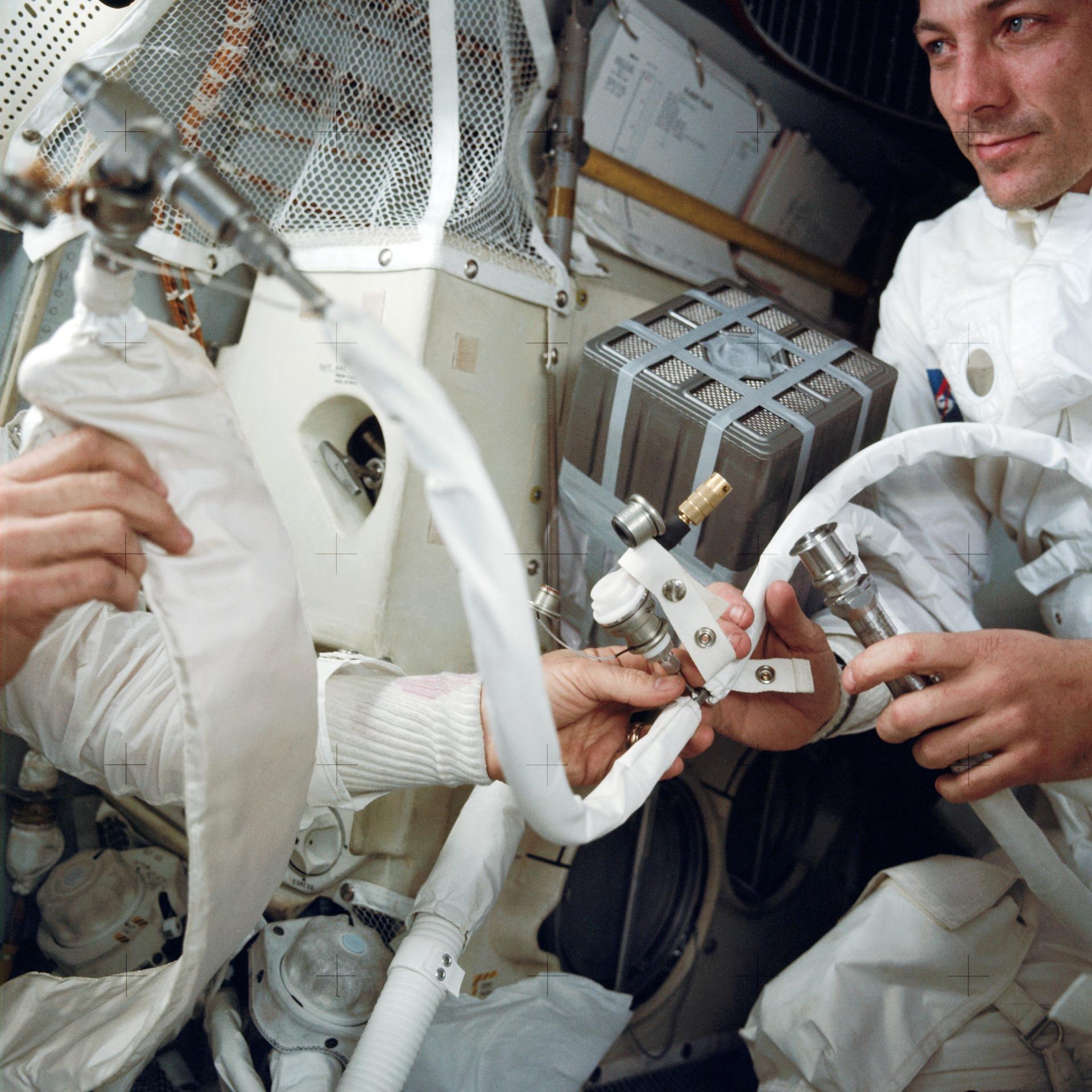 Apollo 13 Crew Installing “Mail Box” for Purging Carbon Dioxide From Lunar Module—April 14, 1970.