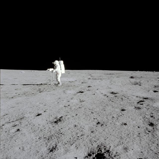 NASA image: Apollo 14 Mission image - View of Astronaut Mitchell with a TV camera facing north. 