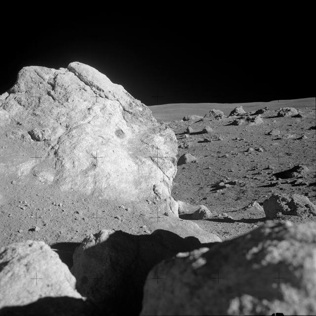 NASA image: Apollo 14 Mission image - View of large boulders overlooking a boulder field.
