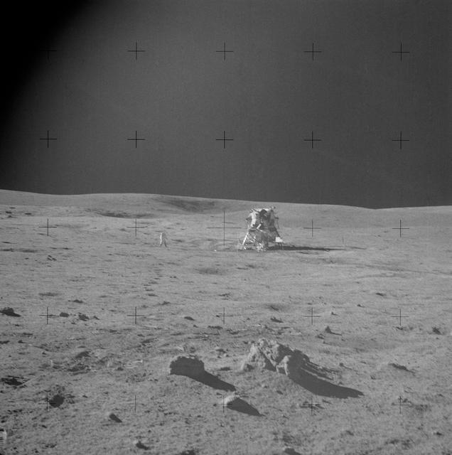 NASA image: Apollo 14 Mission image - View of the Lunar Module with Triplet and an Astronaut in the background.