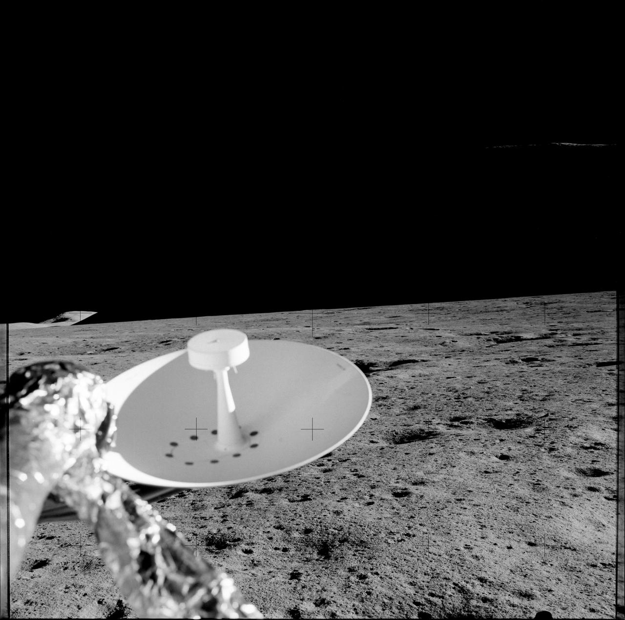 AS15-85-11363 (31 July 1971) --- A 70mm handheld Hasselblad was aimed through the viewing port of the Apollo 15 Lunar Module (LM) to record this image of the lunar surface in the vicinity of the Hadley-Apennine landing site. Later, astronauts David R. Scott, commander, and James B. Irwin, lunar module pilot, made the mission's first moon walk. The pair had descended from lunar orbit in the LM to explore the moon while astronaut Alfred M. Worden, command module pilot, remained with the Command and Service Modules (CSM) in lunar orbit.