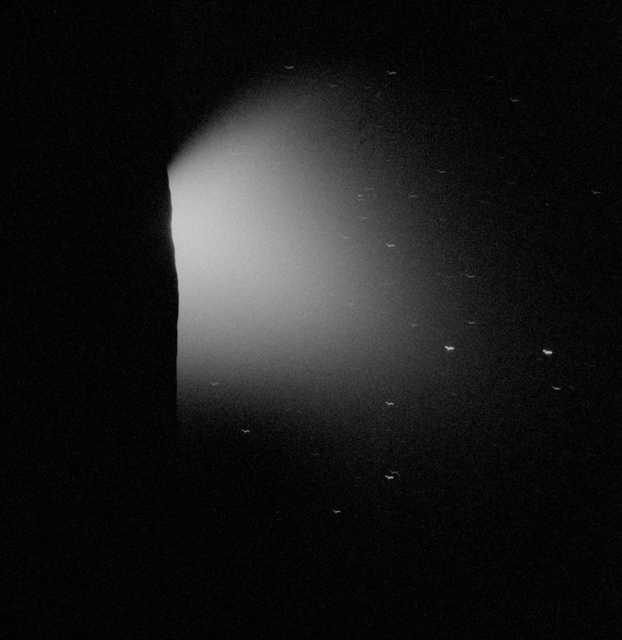 AS15-98-13311 (31 July 1971) --- The solar corona, as photographed from the Apollo 15 spacecraft about one minute prior to sunrise on July 31, 1971, is seen just beyond the lunar horizon. The bright object on the opposite of the frame is the planet Mercury. The bright star near the frame center is Regulus, and the lesser stars form the head of the constellation Leo. Mercury is approximately 28 degrees from the center of the sun. The solar coronal streamers, therefore, appear to extend about eight degrees from the sun's center. This solar corona photograph was the second in a series of seven. Three such series were obtained by astronaut Alfred M. Worden, command module pilot, during the solo part of his lunar orbital flight. They represent man's first view of this part of the sun's light. While astronauts David R. Scott, commander, and James B. Irwin, lunar module pilot, descended in the Lunar Module (LM) "Falcon" to explore the Hadley-Apennine area of the moon, astronaut Worden remained with the Command and Service Modules (CSM) in lunar orbit.