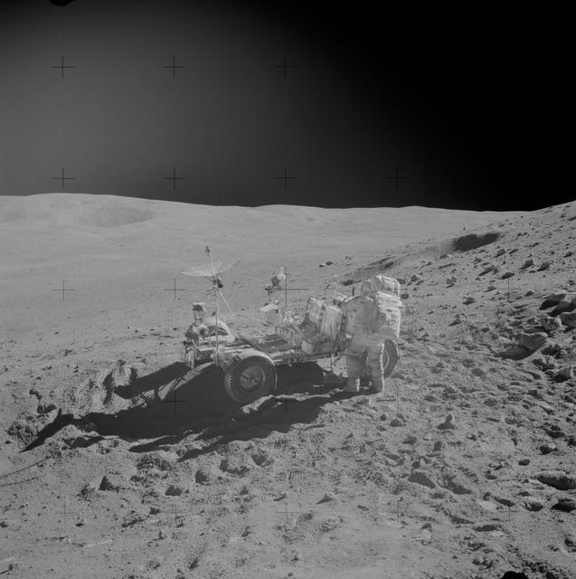 NASA image: Astronaut John Young replaces tools in Lunar Roving Vehicle during EVA