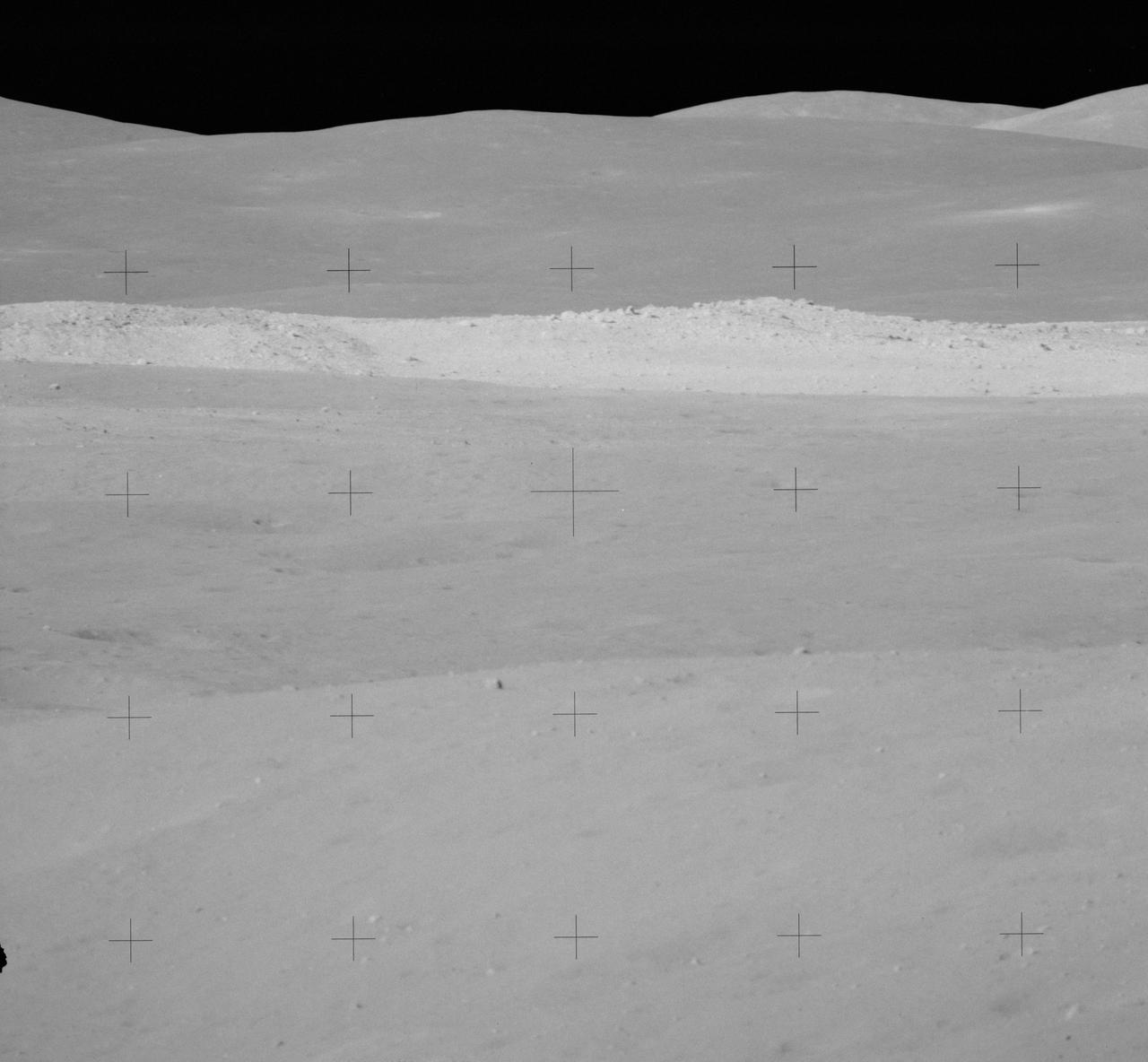 AS16-112-18234 (22 April 1972) --- This view of South Ray Crater was taken during the second Apollo 16 extravehicular activity (EVA) from Station No. 4 -- highest point on the traverse up Stone Mountain -- using a 500mm lens. South Ray Crater is a "fresh" source of angular ejecta in the LM-ALSEP area and samples at Station No. 8.