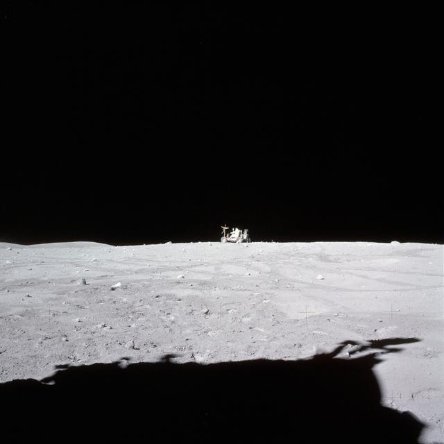 NASA image: Astronaut John Young drives Lunar Roving Vehicle to final parking place