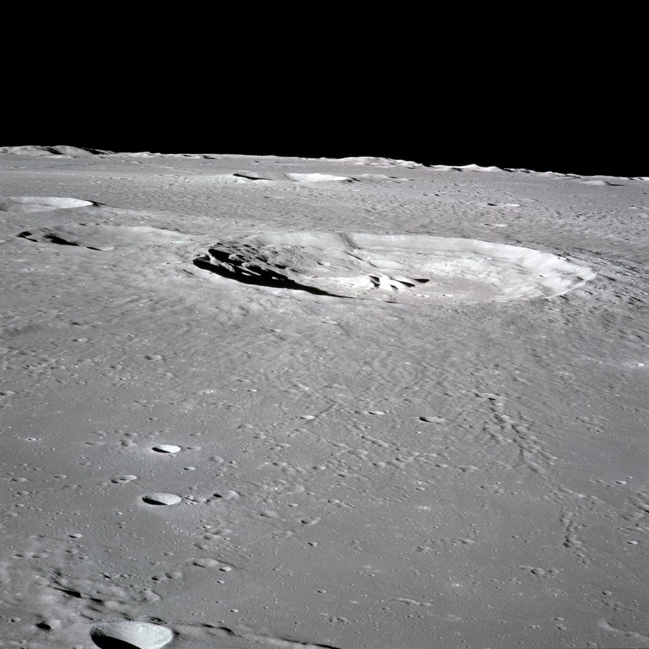 AS16-120-19242 (16-27 April 1972) --- This 70mm handheld camera's view of the moon, photographed during the Apollo 16 mission's lunar orbit, features Crater Bullialdus, located at approximately 20 degrees south latitude and 20.8 west longitude.