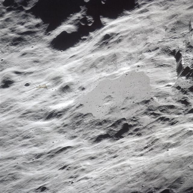 NASA image: Apollo 16 Mission image - Partly filled crater north of King.
