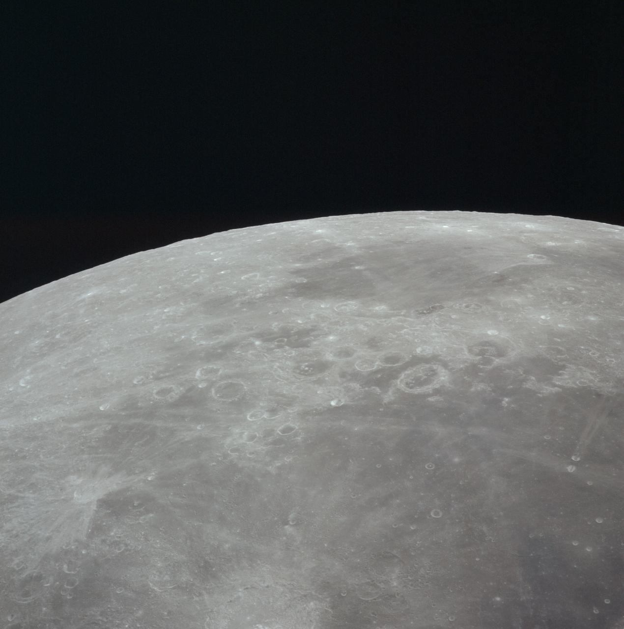 AS16-121-19449 (16-27 April 1972) --- This 70mm handheld camera's view of the moon, photographed during the Apollo 16 mission's trans-Earth coast, features Mare Fecunditatis (Sea of Fertility) in the foreground with the twin craters Messier at the lower right. Nearer the horizon is Mare Nectaris (Sea of Nectar) with craters Goclenius and Gutenberg in between. Goclenius is located at approximately 10 degrees south latitude and 45 degrees east longitude.