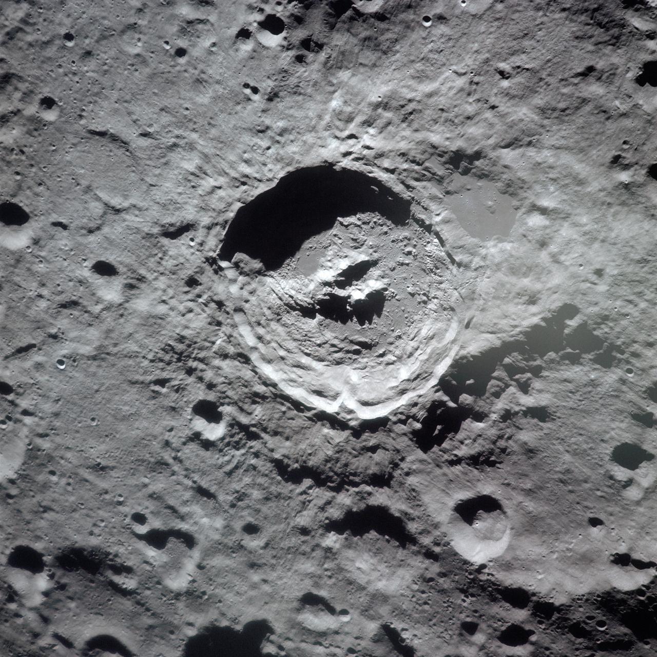 AS16-122-19580 (16-27 April 1972) --- This vertical view shows the King Crater on the lunar surface. It was exposed with color positive film in a hand-held 70mm camera onboard the Command and Service Modules during the Apollo 16 mission's 98th orbit of the moon. Center point coordinates are located at 5.4 degrees north latitude and 120.8 degrees east longitude.