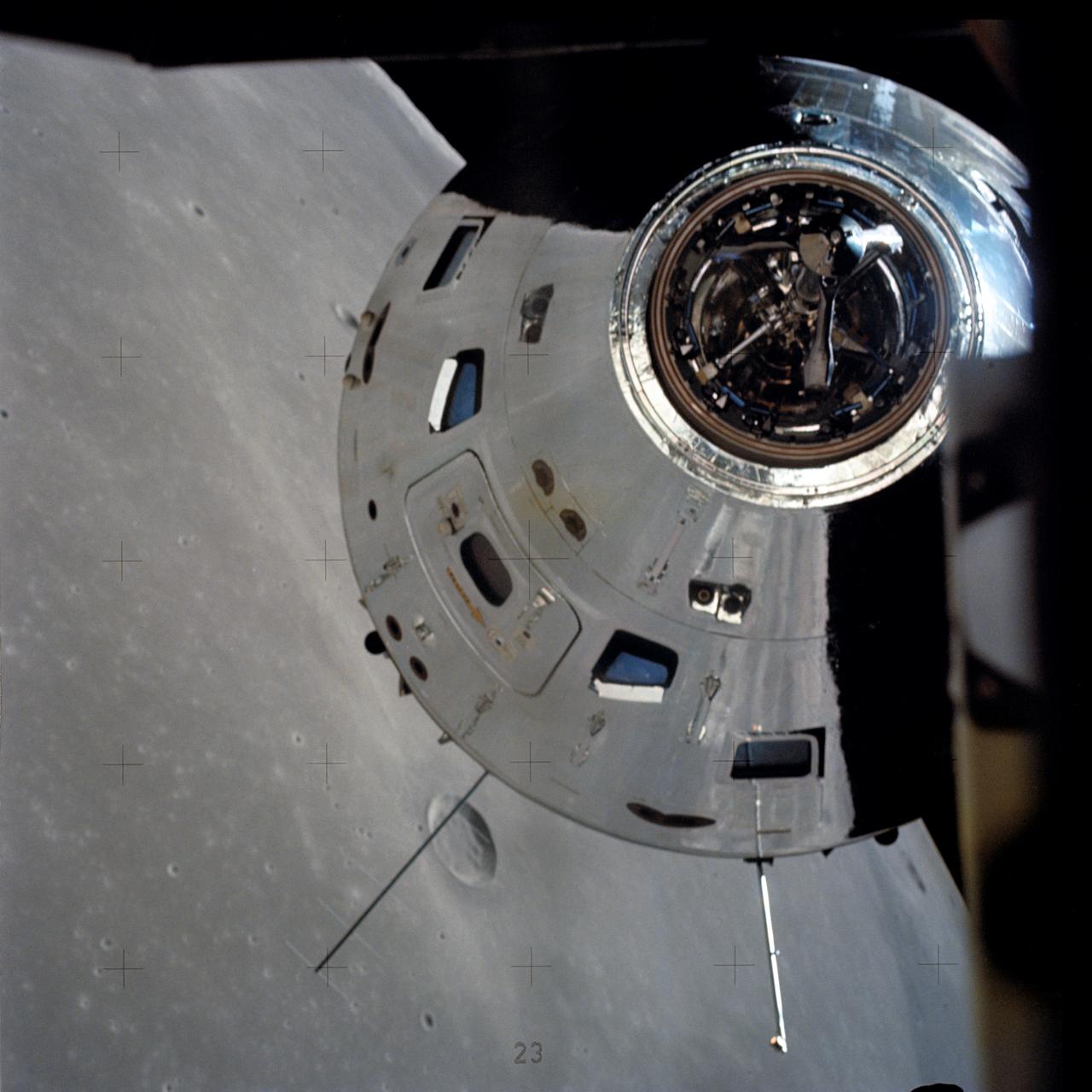 AS17-145-22273 (7-19 Dec. 1972) --- In this view, taken from the Lunar Module (LM), the Command and Service Module (CSM) are seen preparing to rendezvous with the LM. Note the reflection of the lunar surface on the CSM. The CSM, is piloted by Ronald E. Evans; while astronauts Eugene A. Cernan, commander; and Harrison W. Schmitt, lunar module pilot, are onboard the LM, following their extravehicular activities (EVA) on the moon's surface. While astronauts Cernan and Schmitt descended in the LM "Challenger" to explore the Taurus-Littrow region of the moon, astronaut Evans remained with the CSM "America" in lunar orbit.