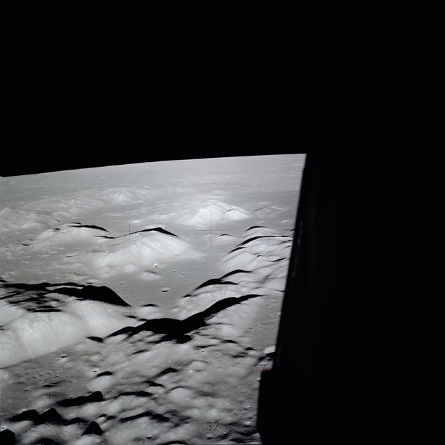 Apollo 17 Command/Service Modules backdropped against lunar landing site