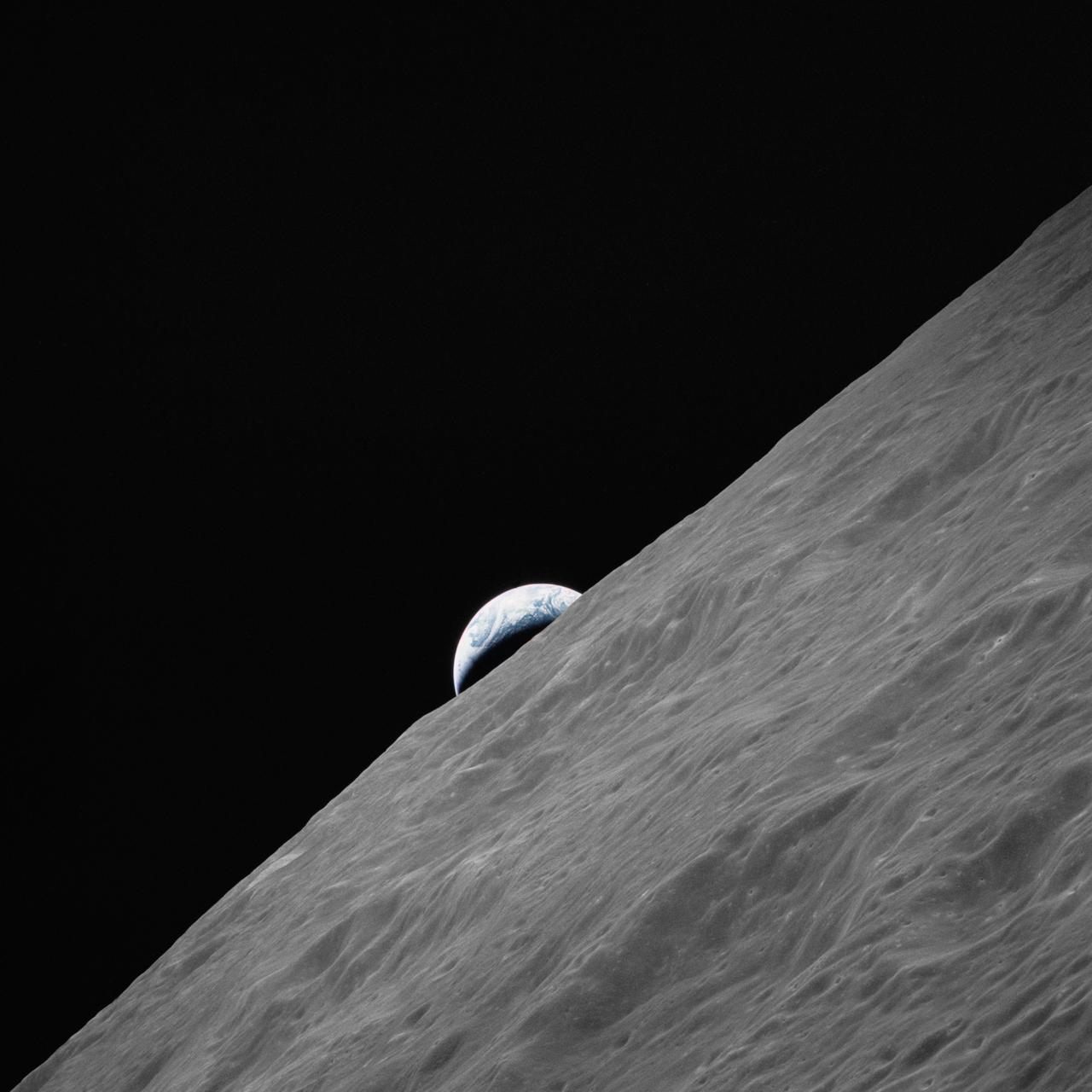 AS17-152-23272 (7-19 Dec. 1972) --- The crescent Earth rises above the lunar horizon in this photograph taken from the Apollo 17 spacecraft in lunar orbit during National Aeronautics and Space Administration's (NASA) final lunar landing mission in the Apollo program. While astronauts Eugene A. Cernan, commander, and Harrison H. Schmitt, lunar module pilot, descended in the Lunar Module (LM) "Challenger" to explore the Taurus-Littrow region of the moon, astronaut Ronald E. Evans, command module pilot, remained with the Command and Service Modules (CSM) "America" in lunar orbit.