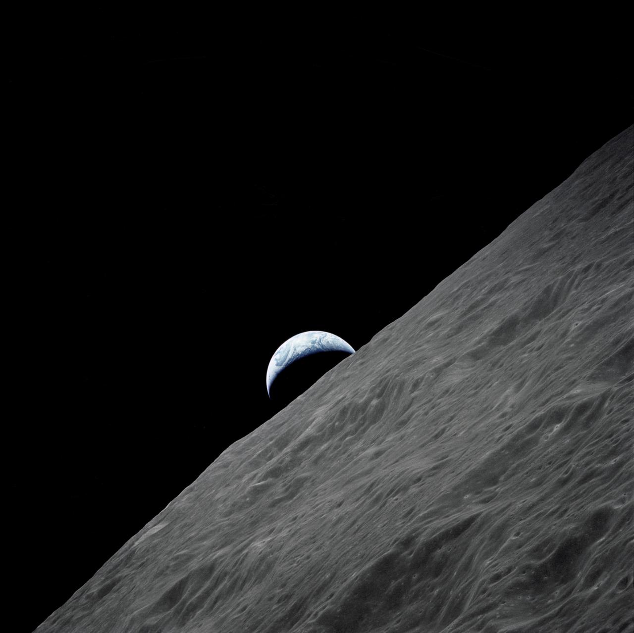 AS17-152-23274 (7-19 Dec. 1972) --- The crescent Earth rises above the lunar horizon in this spectacular photograph taken from the Apollo 17 spacecraft in lunar orbit during National Aeronautics and Space Administration's (NASA) final lunar landing mission in the Apollo program. While astronauts Eugene A. Cernan, commander, and Harrison H. Schmitt, lunar module pilot, descended in the Lunar Module (LM) "Challenger" to explore the Taurus-Littrow region of the moon, astronaut Ronald E. Evans, command module pilot, remained with the Command and Service Modules (CSM) "America" in lunar orbit.